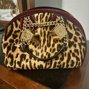 CHRISTIAN DIOR
Vintage Gambler Dice Bowler Bag.